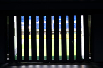 暗闇から見るサッカー場スタジアムピッチ
Soccer field stadium pitch seen from the dark
