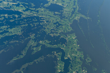 Aerial photo of the Amazon rainforest and the Amazon River basin in Brazil.