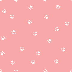 Seamless vector pattern with cat or dos paws prints on pink background.