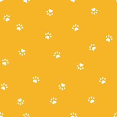 Seamless vector pattern with cat or dos paws prints on yellow background. - obrazy, fototapety, plakaty
