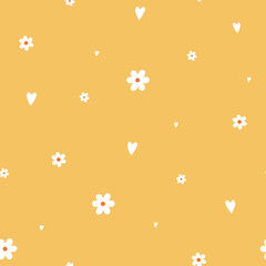 Seamless pattern with cute small flowers and hearts on yellow background.