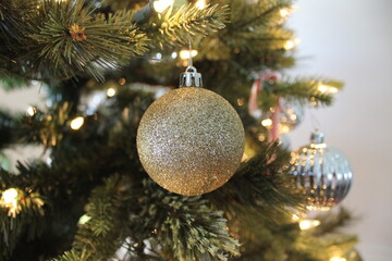 Glittery Christmas ornament on a Christmas tree
