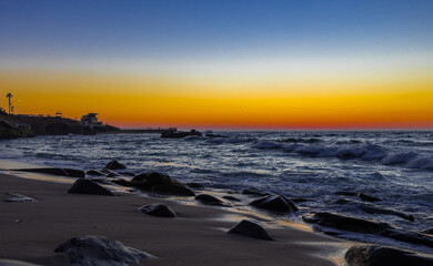Obraz premium Sunset on the beach at La Jolla Cove, San Diego, California