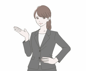 案内をするスーツを着た女性