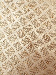 Obraz premium Stamped metal background pattern with light rust on silver surface