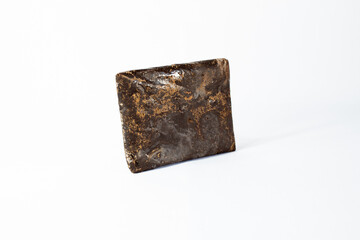 Homemade rectangular piece of chocolate,pure cocoa with white background