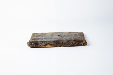 piece of homemade chocolate ,pure cocoa with white background