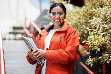 Im ready to tackle this new experience. Shot of a young female student at college.