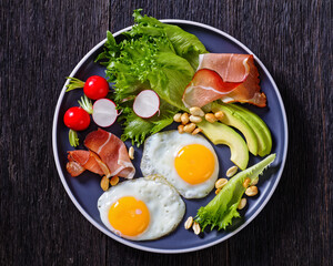 fried eggs, lettuce, avocado, radish, peanuts, ham