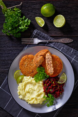 salmon patty with potato mash and beetroot salad