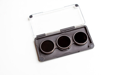 Grey neutral density filter set for action camera. ND filter with magnetic fastening system.  White background