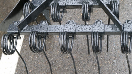 Parts and components of agricultural machines. Plough. Harrow. Cultivator. Fragment.