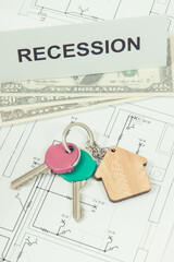 Home keys, dollar and inscription recession on housing plan. Crisis of real estate market. Reduced housing prices