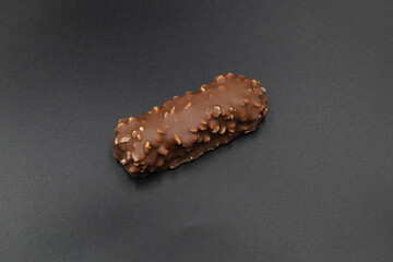 chocolate bar on black background