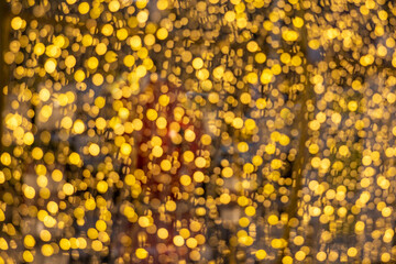 Abstract circular bokeh background of yellow Christmas lights