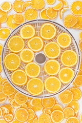 background of round orange slices, top view
