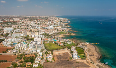 Obraz premium Beaches and hotels of the first line of the Mediterranean Sea in Protaras, Cyprus, aerial view