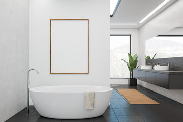 Obraz na płótnie Canvas Front view on dark bathroom interior with empty white poster