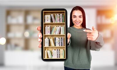 Woman pointing at smartphone with online library, blurred background