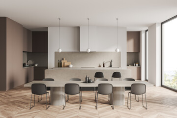 Light kitchen interior with chairs and dining table, appliances and window