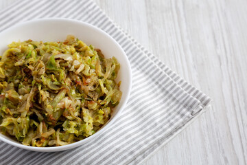 Homemade Irish Sauteed Cabbage in a Bowl, side view. Copy space.