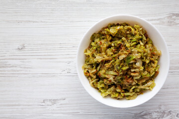 Homemade Irish Sauteed Cabbage in a Bowl, top view. Flat lay, overhead, from above. Copy space.