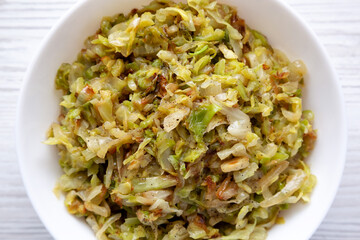Homemade Irish Sauteed Cabbage in a Bowl, top view. Flat lay, overhead, from above. Close-up.
