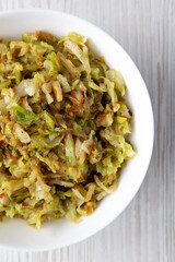 Homemade Irish Sauteed Cabbage in a Bowl, top view. Flat lay, overhead, from above. Close-up.