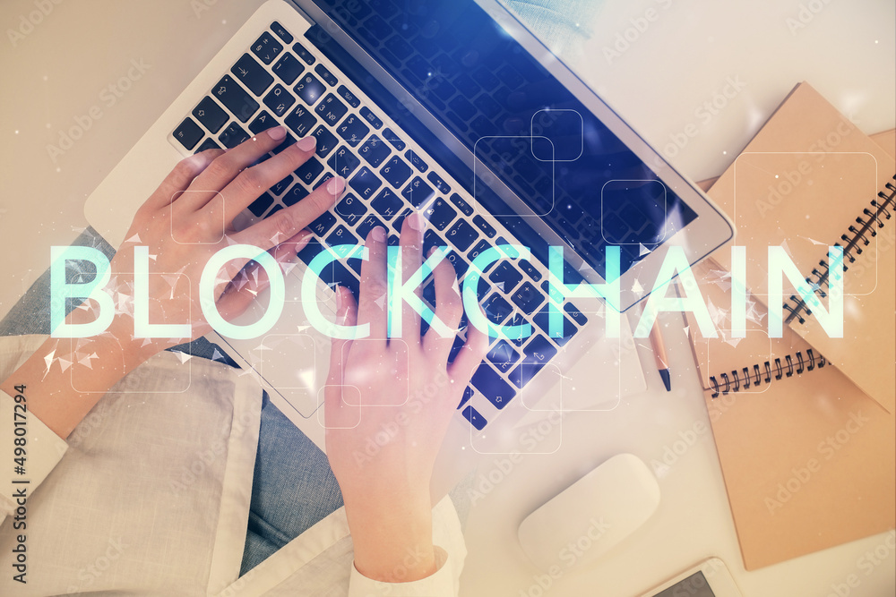 Poster Double exposure of woman hands working on computer and blockchain theme hologram drawing. Top View. bitcoin cryptocurrency concept.