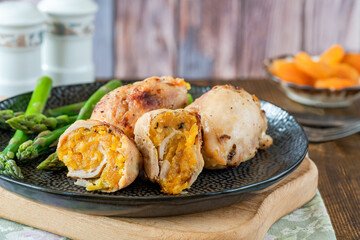 Chicken thighs with appricot stuffing and asparagus