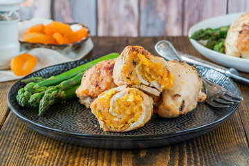 Chicken thighs with appricot stuffing and asparagus