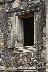 Exploring the ancient ruins of temples in the Angkor Wat complex near Siem Reap, Cambodia