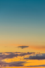 Cover page with gradient deep blue sky, illuminated clouds at bloody sunset as a background.