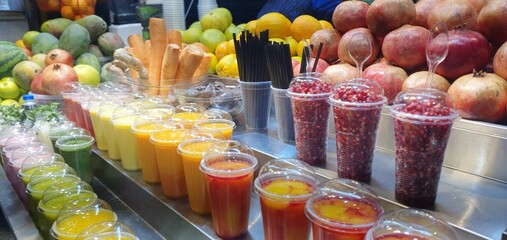 Fresh fruit smoothies for sale at the market 