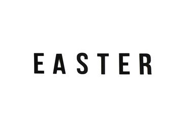 Top view, black wooden text easter on white background isolated.