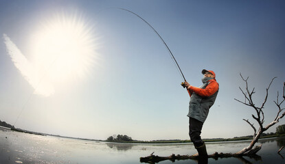 Fishing background. Fisherman catching on a lake.	