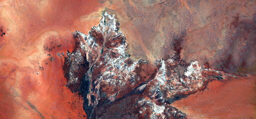 abstract landscape of the deserts of Africa from the air emulating the war in spring, shapes and...