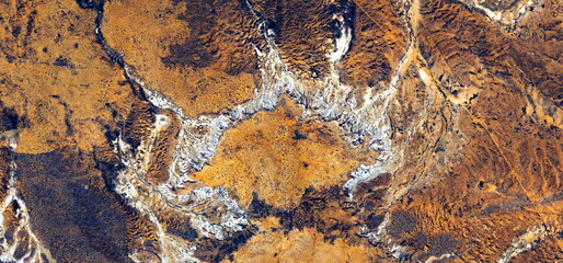 abstract landscape of the deserts of Africa from the air emulating the shapes and colors of landscape After The Trump, Genre: Abstract Naturalism, from the abstract to the figurative