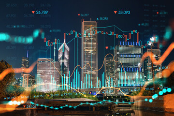 Chicago downtown area city view, Millennium Park area, night time, Illinois, USA. Skyscrapers. Forex graph hologram. The concept of internet trading, brokerage and fundamental analysis