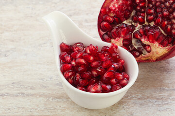Ripe red Pomegranate seeds in the bowl