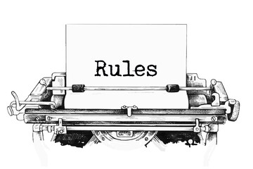 Rules title text written with vintage typewriter close up on paper