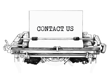 text CONTACT US on the old vintage typewriter