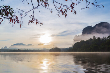 Ban Nong Thale the natural scenery of the sunshine in the morning (mountains, lakes, trees, fog), Thailand.