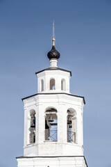 Fototapeta na wymiar bell tower of the Orthodox church in the city