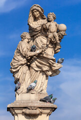 Fototapeta na wymiar Statue of St. Anne on the Charles bridge in Prague