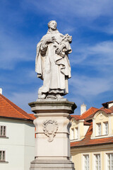 Fototapeta na wymiar Statue of Philip Benizi de Damiani on the Charles bridge in Prague