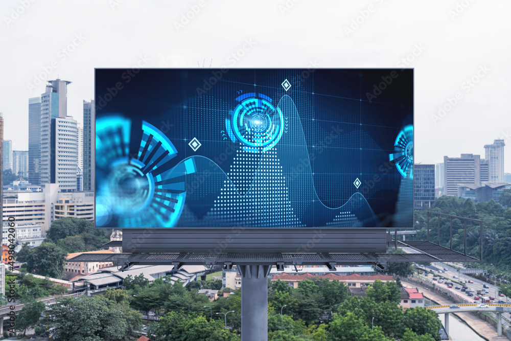 Poster technology hologram on billboard over panorama city view of kuala lumpur. kl is the largest tech hub