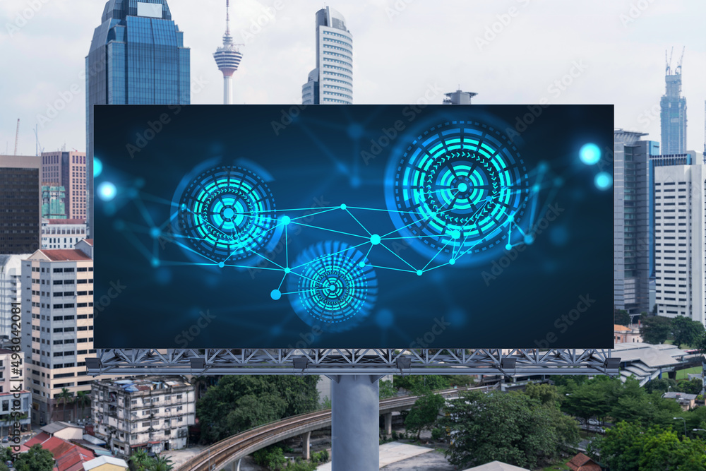 Poster technology hologram on billboard over panorama city view of kuala lumpur. kl is the largest tech hub
