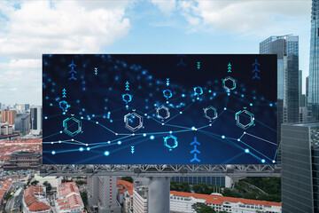 Technology hologram on billboard over panorama city view of Singapore. The largest tech hub in Southeast Asia. The concept of developing coding and high-tech science.