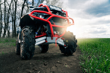 Quad bike ATV on a rural road in the field